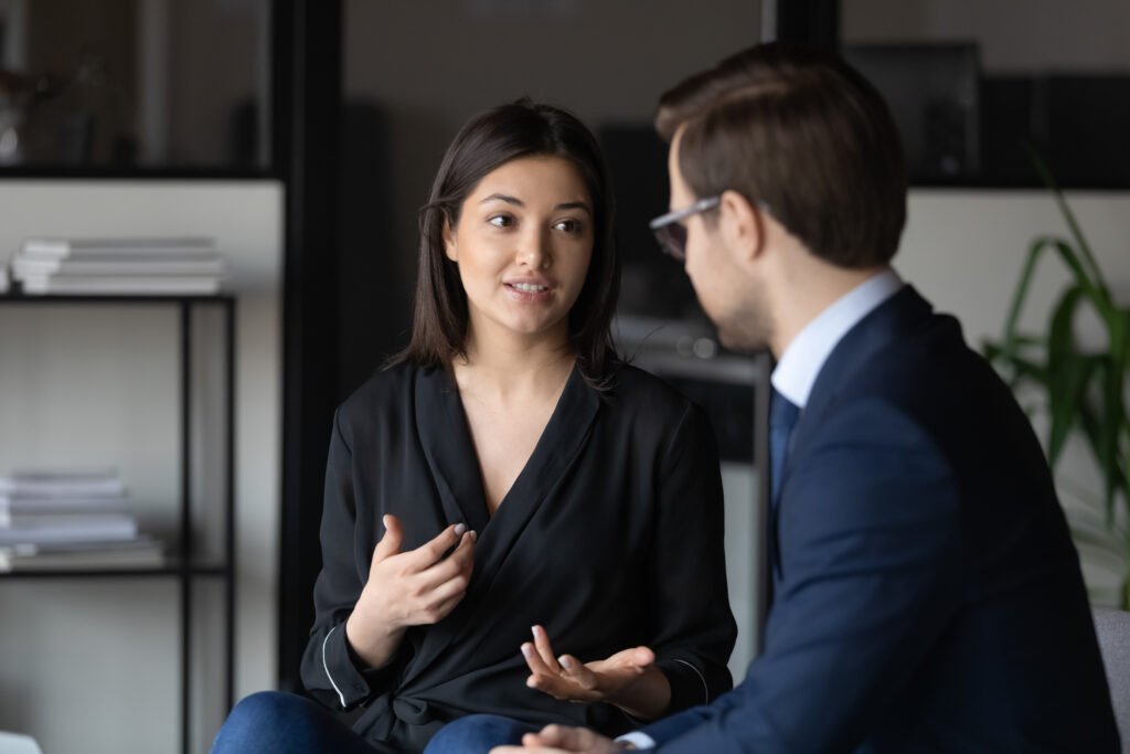 Male and Female talking about business